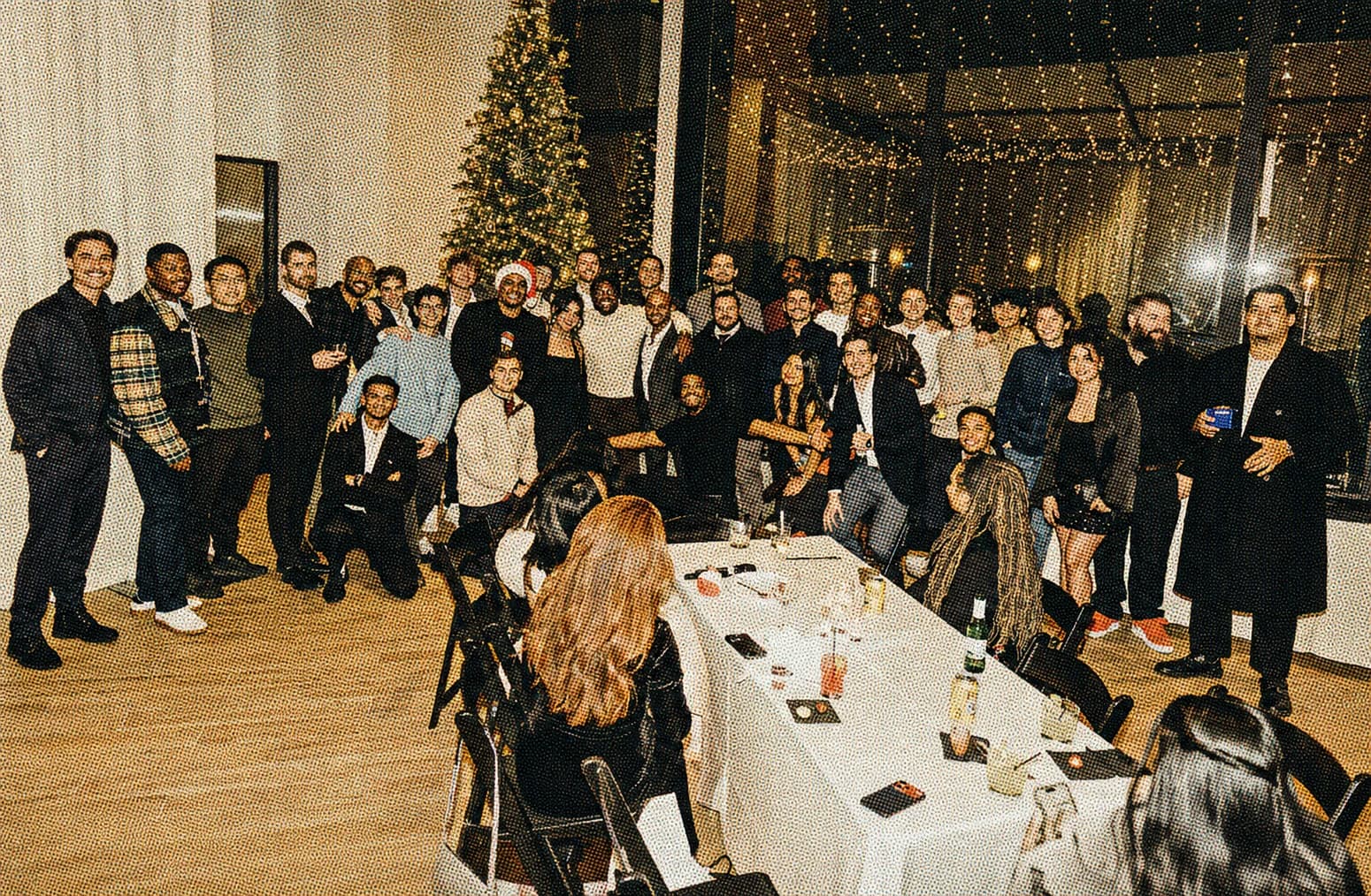 Halftone photograph of the Beagle team together at a holiday celebration